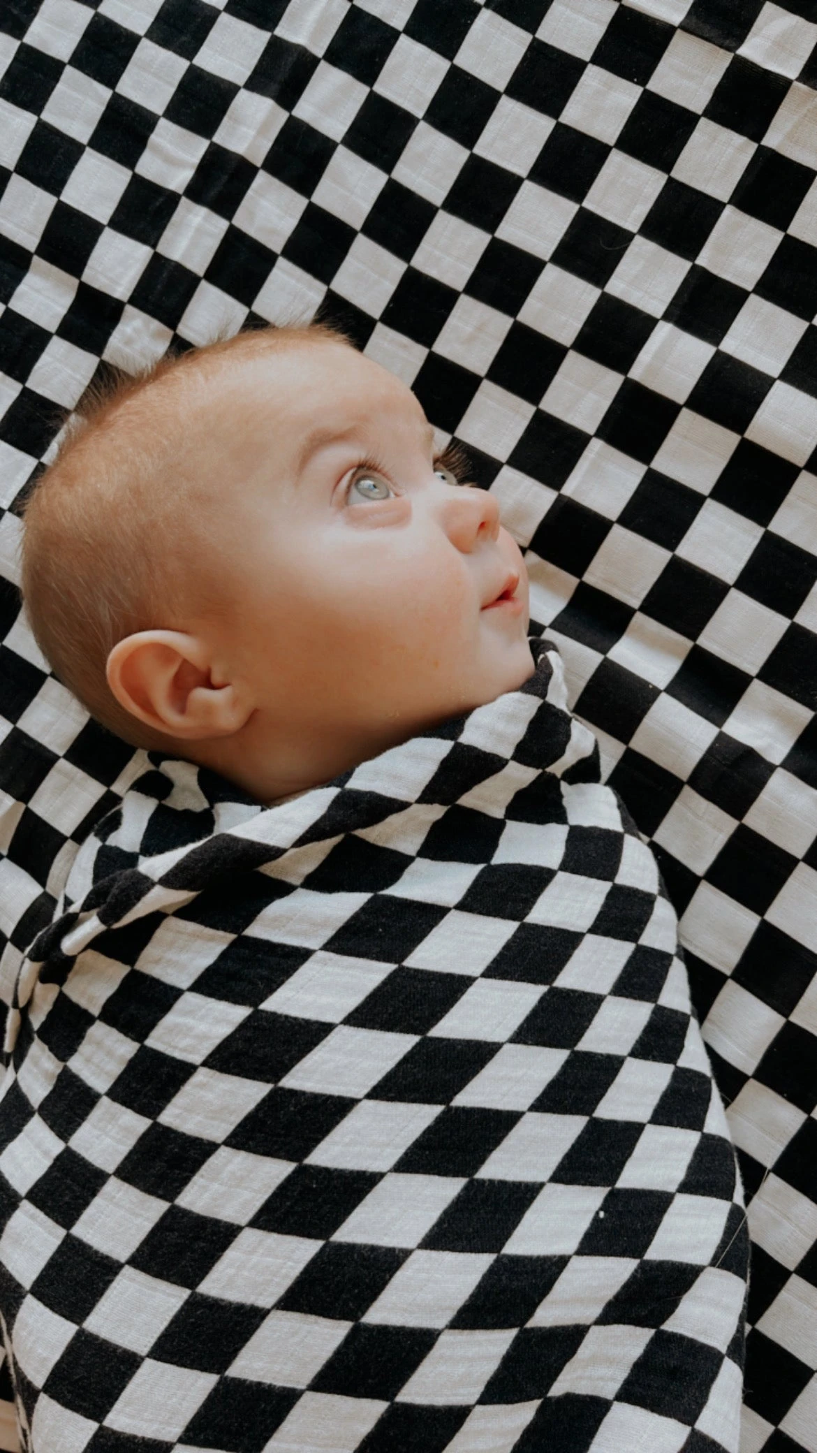Black Checkerboard | Swaddle - Image 2